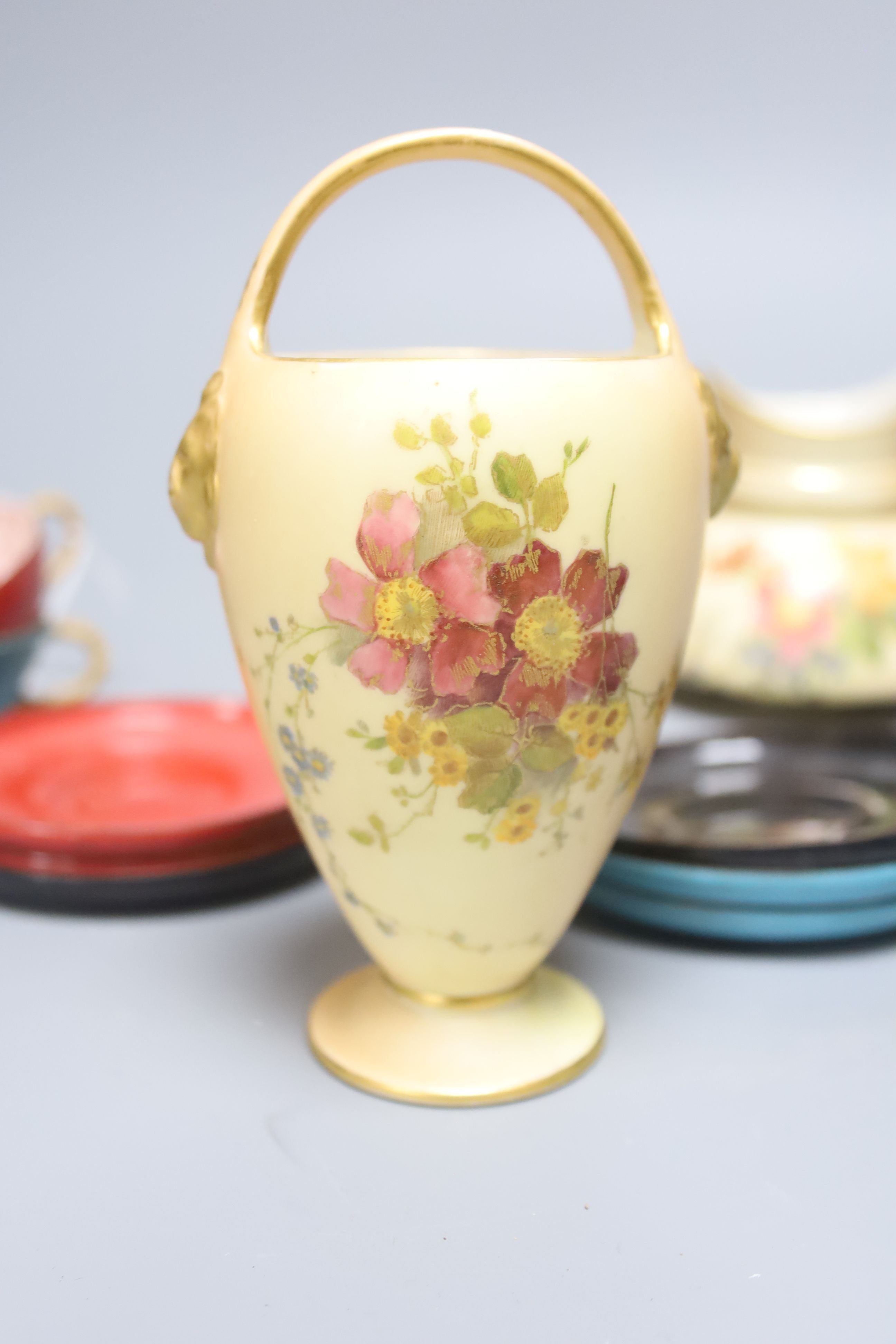 Two Royal Worcester blush pots and a set of six enamelled metal cups and saucers